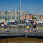 Runners crossing Hull Marina